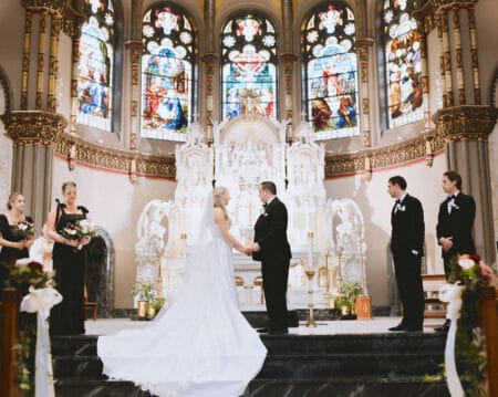 Bride and groom getting married in church